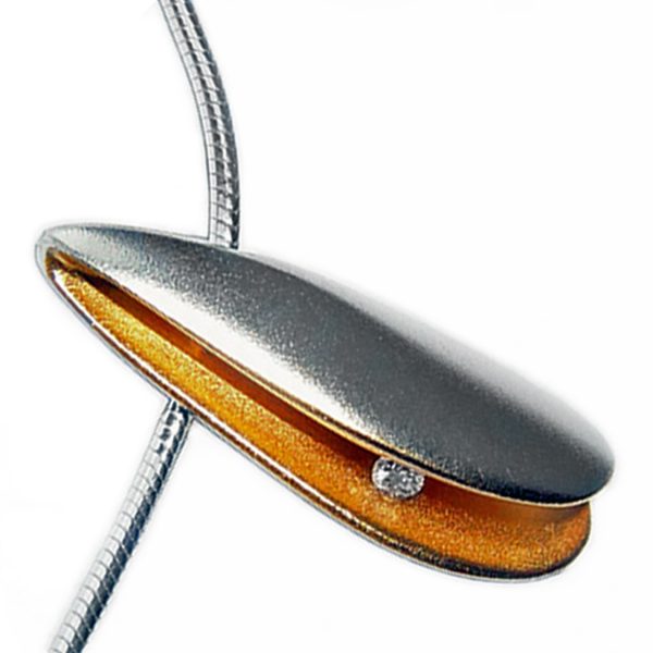 Solid side diamond silver shell pendant with 3pt (0.03ct vsfg) diamond in rich 22ct gold plated interior. It is 24mm in length, 4mm in width and 6mm in depth. The pendant usually comes in a satin finish on a silver snake chain.