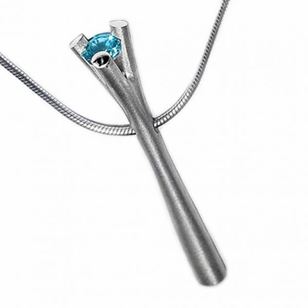 The 3 branch bough pendant tapers from approx 4.5mm at its base to 3.5mm at the neck of the pendant. It is 44 mm long and crafted in solid silver. The unusual setting consists of a 5mm blue topaz gemstone enclosed in 3 silver branches  The pendant comes with a variety of gemstones on a silver snake chain. Choice of gemstones also includes amethyst, iolite, peridot, citrine and garnet.