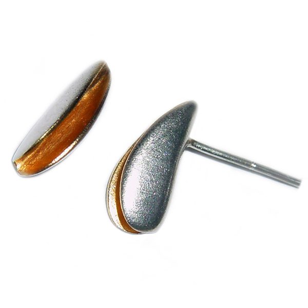 Front split shell studs in silver with rich 22ct gold plated interior. The earrings usually come in a satin finish and approximate maximum dimensions are height 14mm, width 4mm, depth 6mm. These unusual earrings are practical, comfortable and therefore ideal for everyday wear.