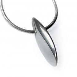 The front plain shell pendant has a smooth organic form. It is approx 22mm long with a width of 4mm and a depth of 8mm at the widest point. The pendant usually comes on a silver snake chain.
