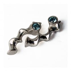 These silver vine drop studs are unusual & stylish and are set with sparkling 3mm gemstones.  The earrings are approx 18mm long with a width of approx 4.5-5.5mm & are available in polished or satin finished sterling silver. The main image shows the earrings with a blue topaz gemstone. You can also choose from amethyst, iolite, peridot, garnet, citrine, cubic zirconia. The silver vine drop studs come in a Paul Finch jewellery gift box. Cleaning instructions For satin finish use silver dip, rinse in warm soapy water, dry thoroughly. For polished finish use silver polishing cloth/ and or silver dip. FREE Delivery The parcel will be sent out using secure Colissimo International tracked and signed for service and will require a signature on receipt. Dispatched within 2-5 working days.