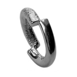 The off set band is a perfectly balanced silver ring of two halves, rough and smooth. The solid silver ring is one of Paul's original designs.The versatile band can be worn with the two halves top & bottom or twisted to create a completely different look. It is approximately 5mm wide and comes in a satin or polished finish. 