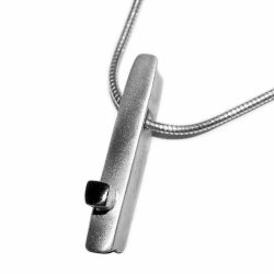 This silver ingot necklace has contrasting polished silver detail. It has approximate dimensions of length 24mm, width 4mm, depth 5mm The pendant comes on a silver snake chain with a thickness of 1.25mm. Please let us know if you would like a 16”/40cm, 18”/45cm, or 20”/50cm chain when you place your order. The solid silver necklace is perfect for everyday wear or special occasions. This silver ingot necklace has a Paul Finch hallmark and conforms to the British hallmarking standard. It is delivered in a Paul Finch jewellery box. Cleaning instructions For satin finish use silver dip, rinse in warm soapy water, dry thoroughly. FREE Delivery The parcel will be sent out using secure Colissimo International tracked and signed for service and will require a signature on receipt. (UK Customers: We will advise you when the parcel has arrived in the UK and is with Parcelforce. If there are any additional charges, they will be fully reimbursed). The pendant will be despatched within 2-5 working days.