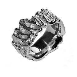 The carved vine band is an unusual solid silver band. The band is approx 11mm at the widest point. The ring is tactile & very comfortable to wear.