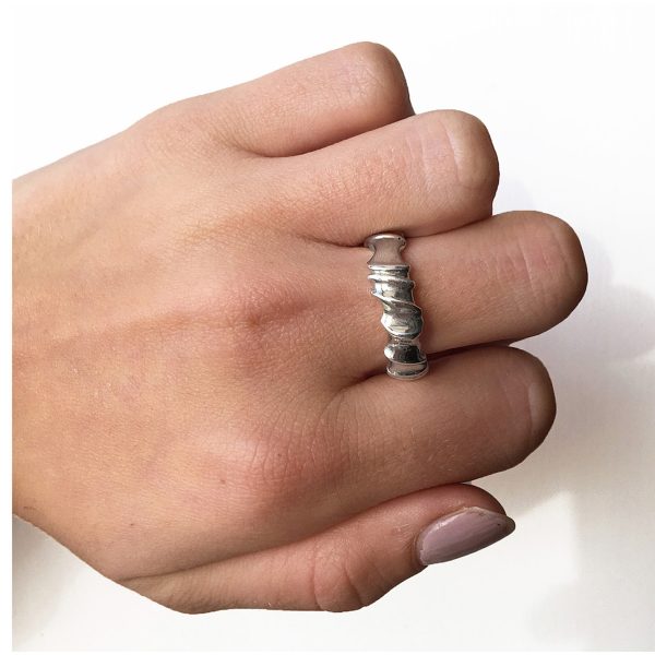 The silver vine band is simple yet striking with its delicate silver detail. The undulating band has a width of approximately 6mm at the widest point and a depth of 3mm. It is solid comfortable and practical, ideal for everyday wear.