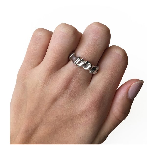 The silver vine band is simple yet striking with its delicate silver detail. The undulating band has a width of approximately 6mm at the widest point and a depth of 3mm. It is solid comfortable and practical, ideal for everyday wear.