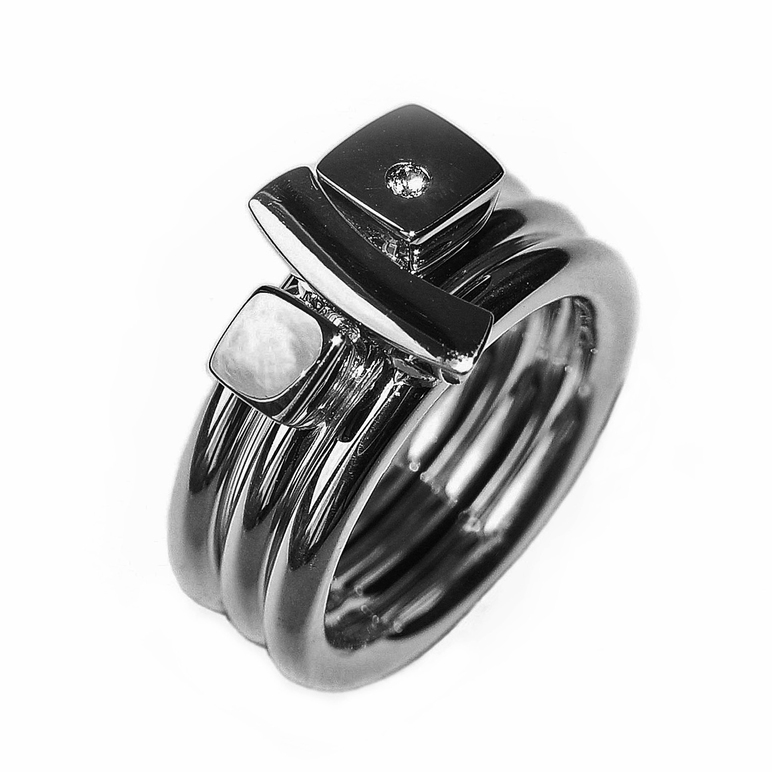 This solid silver diamond ring set 7 consists of three unique rings. Each ring is 2.5mm round with a comfortable rounded shank (maximum width of the ring set is 7.5mm). Each ring has silver detailing, and one ring is set with a single diamond (0.02vsfg). The ring set is also available with 18ct gold detailing or in an all 18ct yellow gold version. The rings can also be bought individually on request.