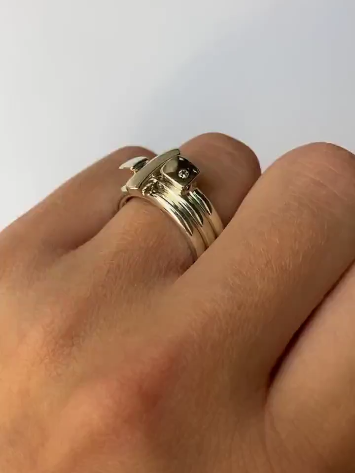 This solid silver diamond ring set 7 consists of three unique rings. Each ring is 2.5mm round with a comfortable rounded shank (maximum width of the ring set is 7.5mm). Each ring has silver detailing, and one ring is set with a single diamond (0.02vsfg). The ring set is also available with 18ct gold detailing or in an all 18ct yellow gold version. The rings can also be bought individually on request.