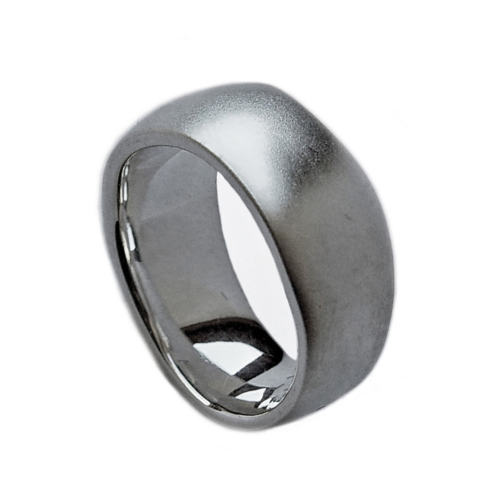 An unusual organic silver band. The smooth solid undulating band is approx 11mm at the widest point and has a varying depth of 2-3mm. It is practical and comfortable to wear. The ring is individually handmade to order and is available in a wide range of sizes including 1/2 sizes. Please let us know your ring size when you place your order. We use the UK/AU sizing system, however. If you have a ring size based on EU, US/Canada or any other international sizing system we can convert it. If you would like the ring in 18ct gold, please contact us for more details. The organic silver band has a Paul Finch hallmark and conforms to the British hallmarking standard. It comes in a branded jewellery box.